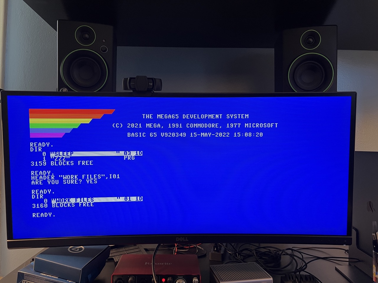 MEGA65 connected to a Dell UltraSharp 27 set to wide aspect ratio, showing BASIC